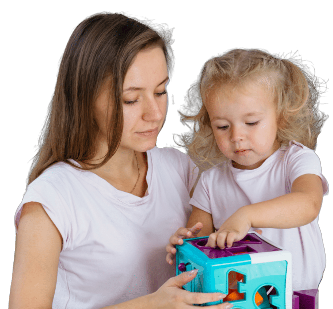 toddler-girl-learning-to-build-with-colorful-block